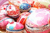 Carefully decorated egg-shaped gift boxes
