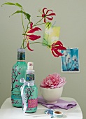 Oriental tea bottles as vases and a money box