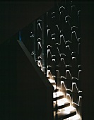 Dramatic light installation in modern stairwell