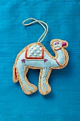 A Christmas tree ornament (camel)