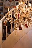 An antique chandelier in a living room