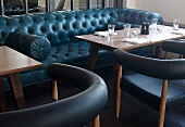 Table with leather sofa in bar