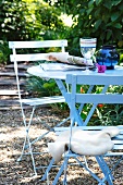 Blue garden table with two chairs