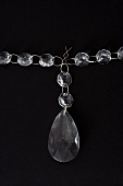 String of transparent glass beads and pendant