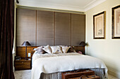 Bedroom with wooden accents and wardrobe front