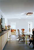 Dining room with carved wooden chairs