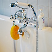 Bathtub tap fittings with hand-held shower head