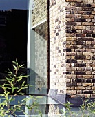 Brick house with glass extension