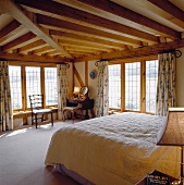 Romantic bedroom in rustic half-timbered building
