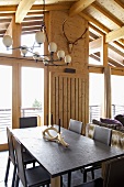 Candlestick on dining table in rustic, modern room