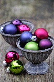 Zinc bowls with colourful Christmas baubles