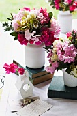 Colourful bunches of flowers as table decoration