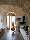 Renovated interior with vaulted stone ceiling in a Trullo house
