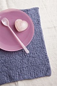 Woollen place mat with plate, fork and rose quartz heart