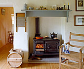 Kitchen with wood-burning stove and cookware