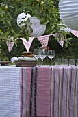 Table laid for party in garden