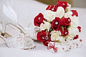 Bridal bouquet, garter, jewellery and shoes