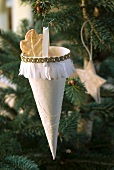 Hand-made paper cone as Christmas tree decoration