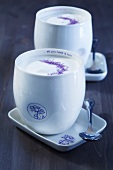 Latte or cocoa with foamy steamed milk and purple sugar