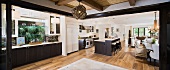 Kitchen dining room and bar area in contemporary home panoramic