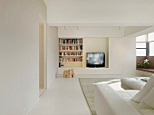 Modern living room with bookcase and television