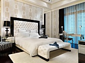 White bed in elegant master bedroom