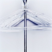 Clothes hangers on a rod