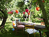 Table & chairs in garden for child's birthday party