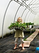 Girl with green plants