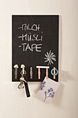 DIY key holder on chalkboard for notes on the wall