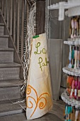 Apron and embroidery silks in craft shop