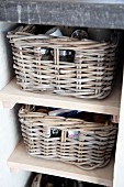 Wicker storage baskets in masonry shelves under kitchen worksurface