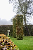 Park-like gardens with clipped hedges & cylindrical shrubs