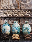 Three Egyptian canopic jars with animal heads