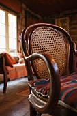 Thonet bentwood chair with cane back in interior