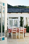 View of set dining table on terrace