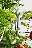 Christmas tree ornament on fir branch