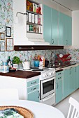 Pale blue, fifties-style fitted kitchen
