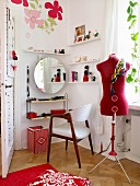 Dressing table and tailors' dummy in corner of girl's bedroom