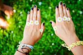 Daisies on a girls hands
