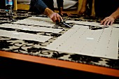 Cutting fabric using paper patterns