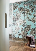 Shower room with floral mosaic in grey and blue