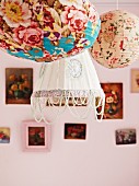 Colourful paper lanterns with patterns of roses