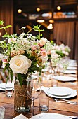 rustic spring wedding table setting with flowers