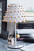 Table lamp with wooden beads decorating lampshade