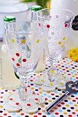Glasses decorated with colourful dots
