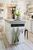 Free-standing counter in white, country-house kitchen