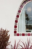 Detail shot of a cropped arched window at Irvine; California; USA