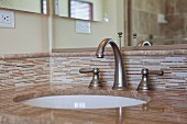 Contemporary bathroom with washbasin and mirror