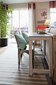 Chairs at table in living room